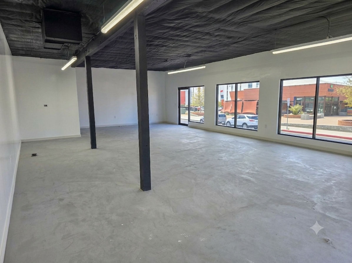 Interior of 670 Lancaster Blvd with storefront windows